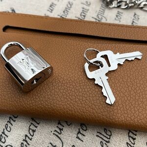 Louis Vuitton Silver Lock and Two Keys # 448.  Brand New